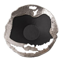 Load image into Gallery viewer, This contemporary flared bowl is a play on abstract, deconstructed design. Fashioned from aluminum, it has a raw, hand formed look that create a dramatic statement for your style. The raw silver finish is accented with cut outs and matte black sections that make the entire piece the perfect finishing touch for your decor. Pair with the coordinating pieces in the collection for a complete look.