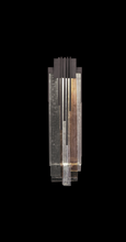 Load image into Gallery viewer, Modern wall-mounted light fixture with glass panels on a black background
