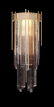 Load image into Gallery viewer, Decorative wall sconce with glass panels on a black background
