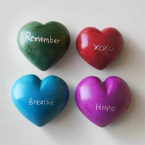 Tiny Hand-Carved Stone Hearts With Patterns