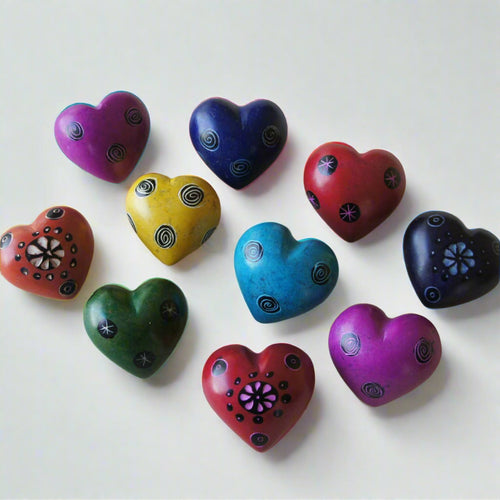 Tiny Hand-Carved Stone Hearts With Patterns