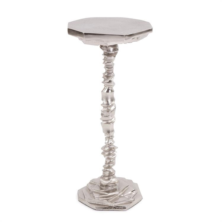 This cast aluminum Martini table will certainly provide the perfect spot to rest your cocktail! The frame is fashioned from cast aluminum to look like layers upon layers of cut rock that make up the piece. The chiseled texture is enhanced by a bright silver nickel finish. Its small footprint makes it the perfect table for small spaces