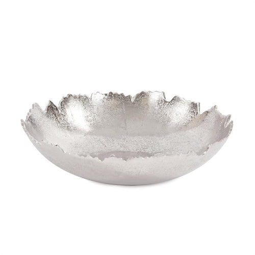 This unique bowl is fashioned from metal and features 