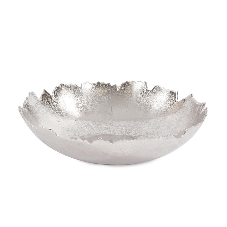 This unique bowl is fashioned from metal and features 