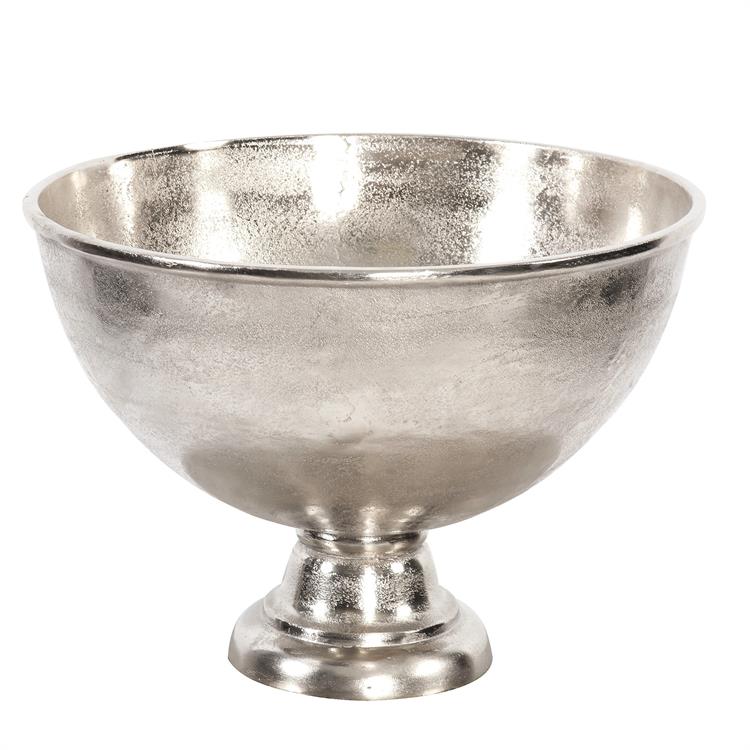 This oversized footed bowl is made with a thick aluminum metal. The well of the piece is set on a round base. The entire bowl is finished in a striking raw bright silver. Base removes for easy shipping.