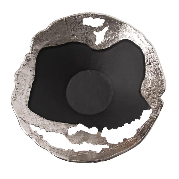 This contemporary flared bowl is a play on abstract, deconstructed design. Fashioned from aluminum, it has a raw, hand formed look that create a dramatic statement for your style. The raw silver finish is accented with cut outs and matte black sections that make the entire piece the perfect finishing touch for your decor. Pair with the coordinating pieces in the collection for a complete look.