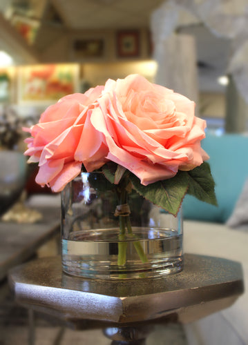 Pink roses in glass vase