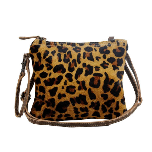 An adorable small sized crossbody bag spacious enough to hold your essentials. Most preferred among our patrons, it comes with an adjustable shoulder strap, to suit your style preference. (6258576359622)