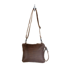 Load image into Gallery viewer, An adorable small sized crossbody bag spacious enough to hold your essentials. Most preferred among our patrons, it comes with an adjustable shoulder strap, to suit your style preference. (6258576359622)
