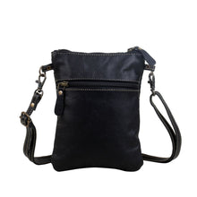 Load image into Gallery viewer, Meet your perfect accessory in the form of this little hairon bag. The strong zipper ensures secure storage and the adjustable straps were tailored for your style preference.
