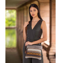 Load image into Gallery viewer, This XOXO crossbody bag is all you need for a casual day. The basic vibe of the bag will make you look effortlessly cool. It is compact but can hold enough essentials to get you through the day.
