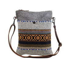Load image into Gallery viewer, Complete your boho look with this tribal pattern crossbody bag. The compact size of the bag makes it easy to carry and the strong zippered top secures your valuables.
